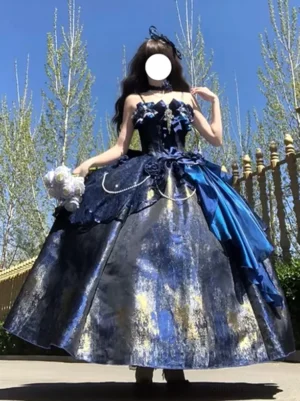 Dark blue gothic lolita sleeveless dress full front view gold shimmer satin bow pearl chains outdoor