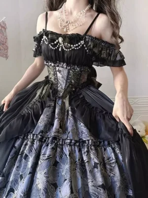 Gothic Lolita dress upper body close-up showing corset waist construction, spaghetti straps, pearl chest ornament and layered floral skirt detail
