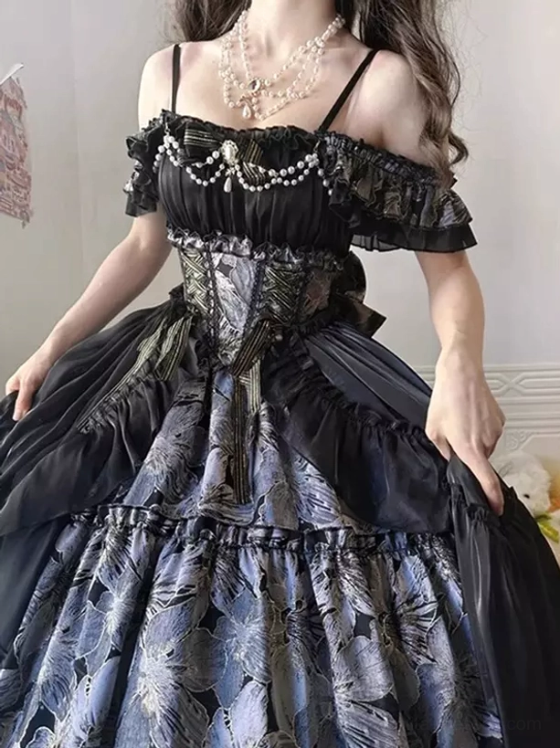 Gothic Lolita dress upper body close-up showing corset waist construction, spaghetti straps, pearl chest ornament and layered floral skirt detail