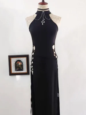 Full-body view of gothic lolita outfit featuring black halter dress with side lace-up cutouts paired with matching silver snake pendant choker, complete styling reference