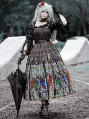 Black gothic lolita stained glass jumper dress showing side profile with high-waisted pleated skirt, square neckline, black choker, and removable ruffled sleeves - model with silver hair holding closed black parasol