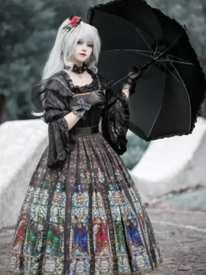 Gothic black lolita stained glass jumper dress with removable ruffled sleeves, high waist design, square neckline, and colorful ecclesiastical print skirt - front side view with model wearing silver hair and red flower hairpin holding black parasol