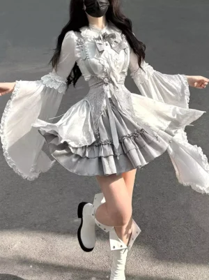 Gothic Lolita outfit dynamic pose mid-jump showing movement of flared sleeves decorative bow and ruffled layered skirt