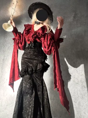 Gothic lolita outfit back three-quarter view showing ruffled sleeve scarves, black rose choker, and mermaid skirt silhouette with model wearing black frilly hat