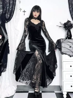 Gothic lolita black velvet mermaid maxi dress with bell sleeves and sheer lace overlay, three-quarter front view on model showcasing fitted bodice and fishtail silhouette