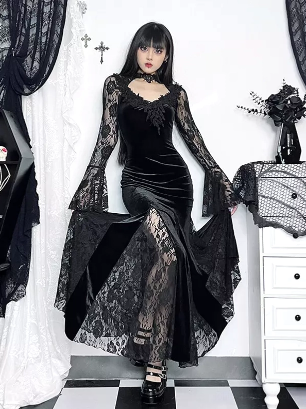 Gothic lolita black velvet mermaid maxi dress with bell sleeves and sheer lace overlay, three-quarter front view on model showcasing fitted bodice and fishtail silhouette