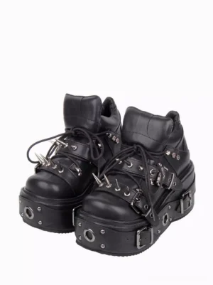 Black Gothic Lolita wedge heel boots with metal spike rivets front view on white background showing PU leather upper and decorative buckles
