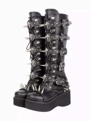 Gothic lolita wedge knee-high boots front three-quarter view black PU leather silver spike skull buckle trims thick platform sole lace-up front design