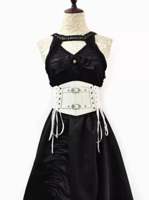 Gothic Lolita white corset belt front view on black dress with silver metal grommets and lace-up straps detail