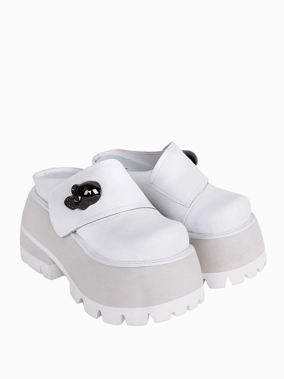 White Gothic platform mule shoes side three-quarter profile view backless slip-on design thick lug sole