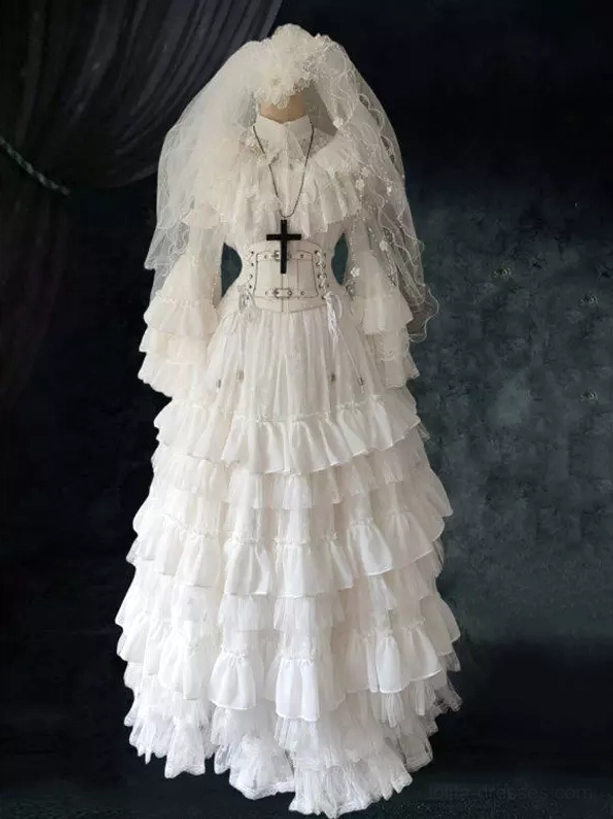 White Gothic lolita wedding dress front full-body product shot on dark background showing tiered ruffled silhouette with bridal veil