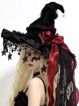 Gothic lolita witch hat black velour red satin bow celestial moon star lace trims on blonde model in black gothic dress profile view