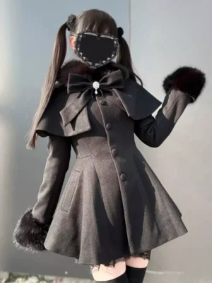 Gothic lolita wool winter coat front three-quarter view with detachable cape faux fur cuffs rhinestone brooch big bow A-line flared hem dark grey