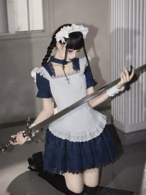 Gothic maid Lolita costume side kneeling pose with sword prop, featuring black thigh-high socks, cross choker, and white lace apron details in dim gothic interior