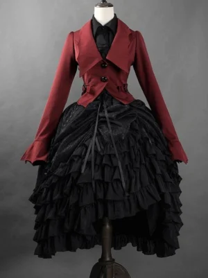 Gothic Ouji jacquard ruffled skirt in black with layered high-low hem, studio display on mannequin showing front silhouette and dramatic ruffle construction
