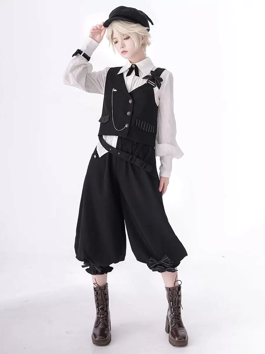 Black Ouji bloomer fashion three-quarter front pose with lace-trimmed cuffs and leather boots