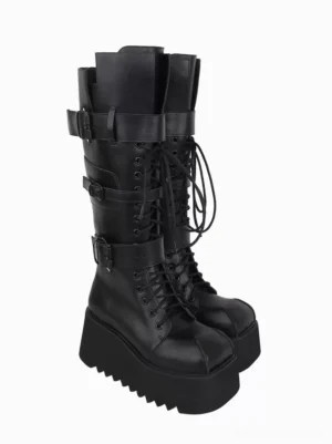 Gothic platform combat boots black side three quarter paired view showing thick ridged platform outsole round toe buckled strap details