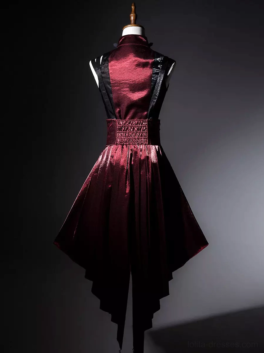 Back view of gothic punk lolita dress showing shirred waistband and high-low velvet hem on display mannequin