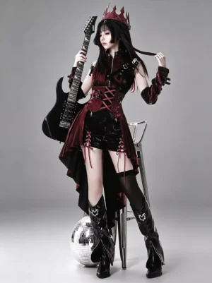 Gothic punk lolita dress three-quarter side view showing detachable arm cuffs and asymmetrical high-low skirt with matching knee-high boots
