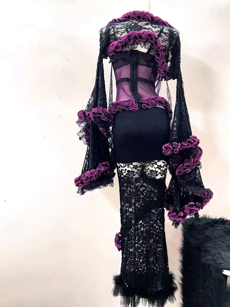 Back view of gothic ruffle lace lolita set on mannequin displaying backless sheer top with bell sleeves and feathered hem on full-length lace skirt
