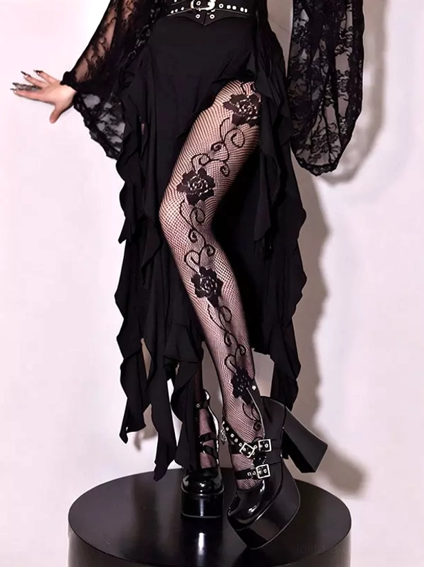 Black rose vine lace fishnet pantyhose front facing leg shot with ruffled gothic dress on display stand