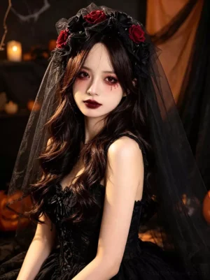 Gothic rose lolita headpiece three-quarter view black tulle veil on model wearing black dress with theatrical makeup