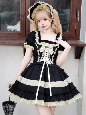 Black and beige gothic sweet lolita dress with lace-up front and ruffles, styled with matching bonnet and lace umbrella on blonde model with twin tails