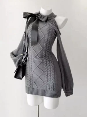 Gray fitted cold shoulder cable knit mini lolita dress with long sleeves shown on dress form, straight front view demonstrating tight silhouette and mini length with black satin accessories
