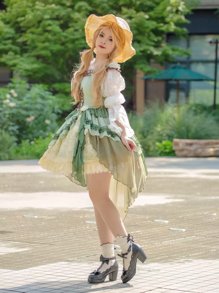 Full side view of green lolita jumper skirt dress with complete coordinate featuring Mary Jane heels, ankle socks, and straw hat accessory