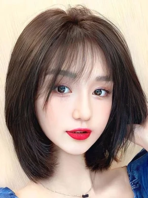 Heat-resistant fiber lolita wig layered dark brown bob cut with natural air bangs front headshot model