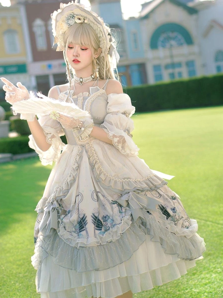 Hime Lolita off-shoulder floral one-piece dress model holding feather fan with matching bonnet European town garden background