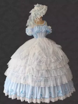 Classic Lolita dress featuring layered white tulle overskirt over light blue base skirt with delicate lace trims, front full-length view on dress form