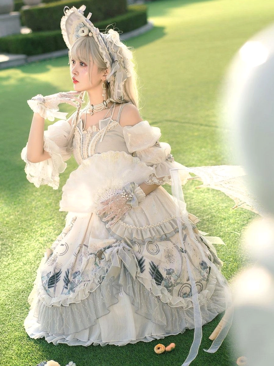 Hime Lolita light gray floral dress front view model wearing lace gloves holding fluffy fan outdoor lawn setting