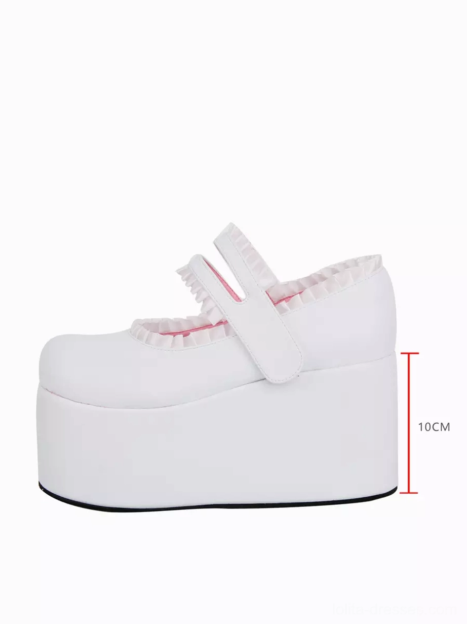 Single ivory lolita wedge shoe left side profile view with marked 10cm thick platform sole, pure white finish, and integrated wedge heel structure