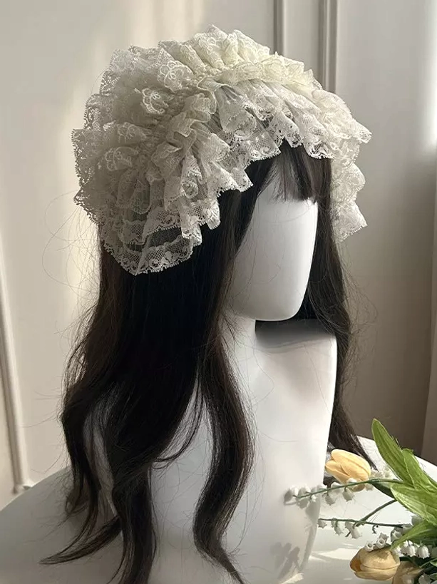 Ivory sleeveless corset Lolita mini dress with spaghetti straps tiered tulle skirt and lace-up bodice detail, Sweet Lolita style fashion piece