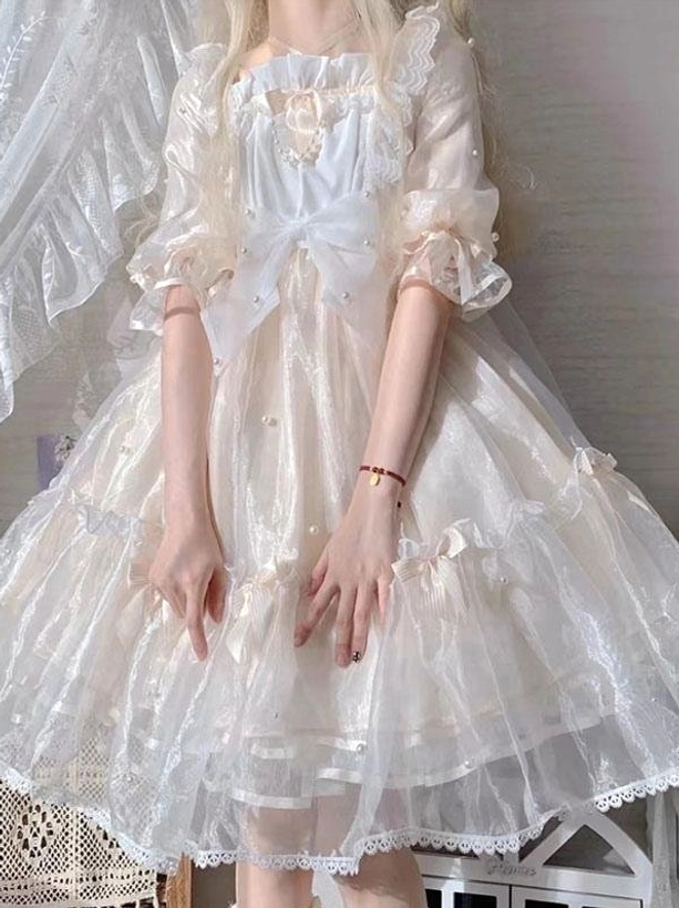 Ivory white sweet lolita fairy dress flat mannequin display showing large front bow ruffled half sleeves tiered skirt