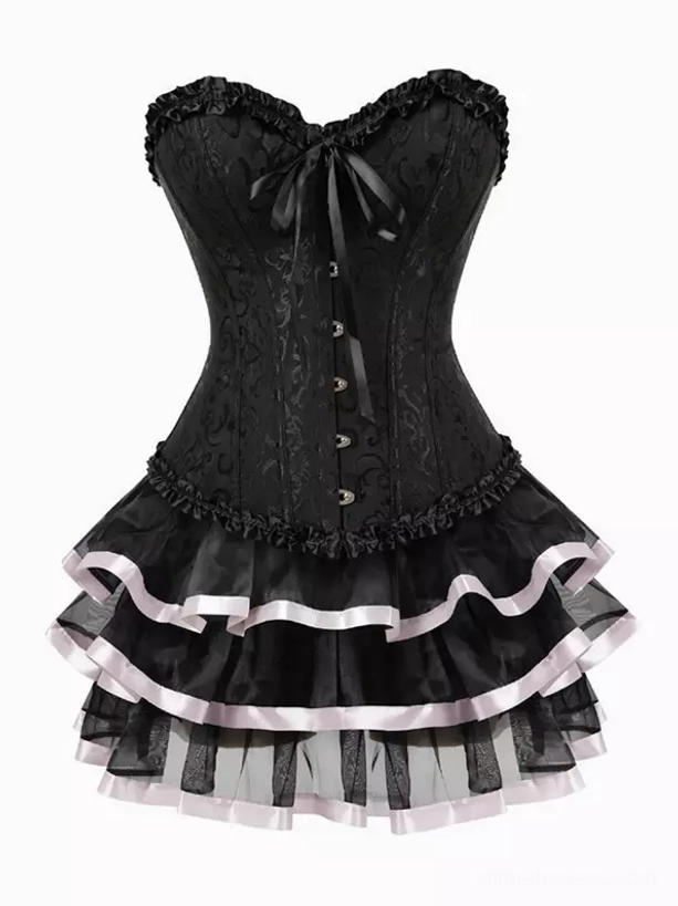 Black jacquard corset with decorative bow and grommet details featuring multi-layer tulle skirt with silver-white ribbon accents