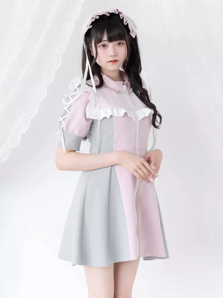 Pink and light gray color block lolita dress front three-quarter view with lace frilly headband ruffled shoulder trim and front zip closure