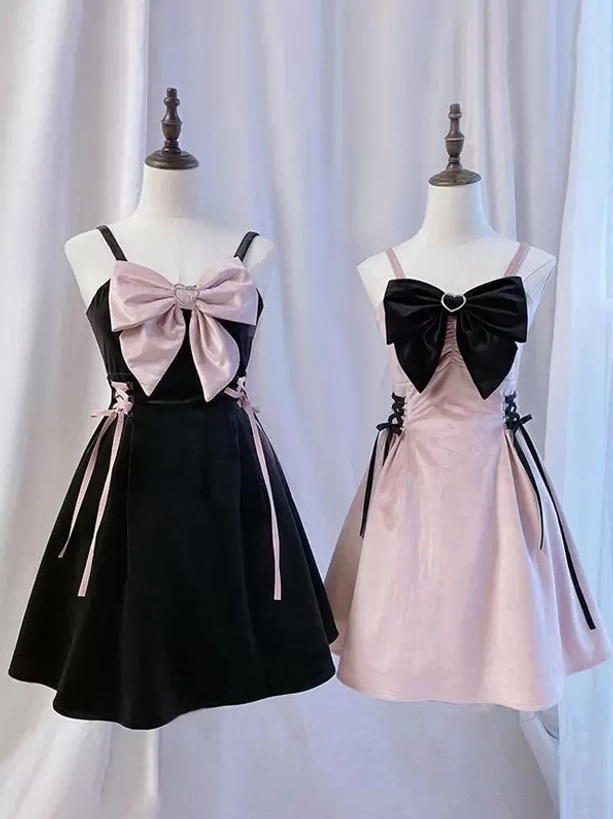Two Jirai Kei gothic lolita slip dresses displayed on mannequins showing color options, spaghetti straps, side lace-up details, and chest bow embellishments