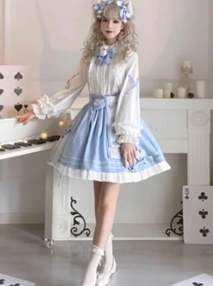 Sky blue and white lolita two-piece skirt set styled with blonde curly hair model wearing blue hair ornaments and frilled white stockings, side-front angle