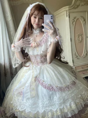Model wearing lavender hime lolita dress with white lace gloves and wedding veil showcasing sweet lolita styling and elegant vintage aesthetic