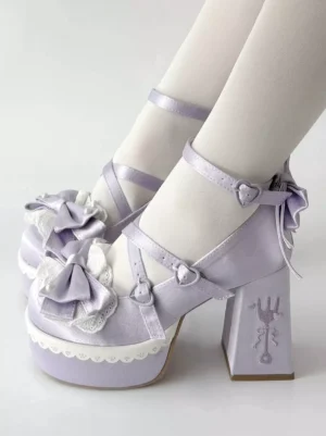 Lavender lolita chunky heel shoes with heart buckle straps and bow decorations worn with white stockings side view