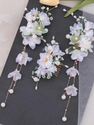 lavender-lolita-hair-accessory-set-with-pearl-chains-fabric-flowers-and-green-leaf-accents-flat-lay-display