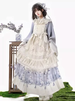 Lavender Classic Lolita three-piece outfit set worn by model in full-body front view, featuring gradient wide-sleeve blouse, sleeveless lace apron dress, and tiered floral skirt in studio setting