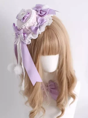 Lolita headdress lavender top hat hair clip front left angle showing satin bows white lace frills and pom-pom details
