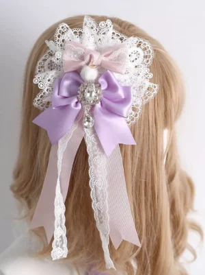 Lavender sweet lolita bow hair clip with white lace dual-layer bows and crystal pendant worn on blonde wig mannequin back view