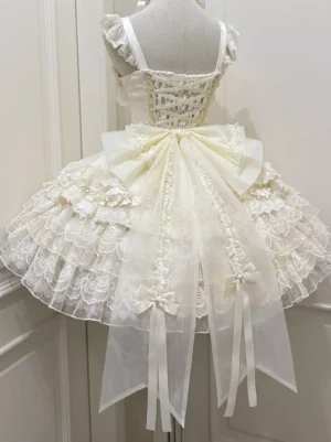 Light apricot cream detachable lolita bow train skirt with lace-up corset back and layered lace, back view on dress form