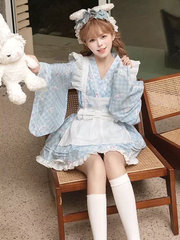 Seated front view of sky blue gingham lolita maid dress showing bunny ear hair accessory loose wide kimono sleeves model holding plush rabbit and relaxed pose