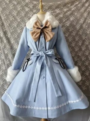 Light blue lolita winter coat front view with white fur collar and cuffs, beige bow accent, and lace hem trim displayed on dress form