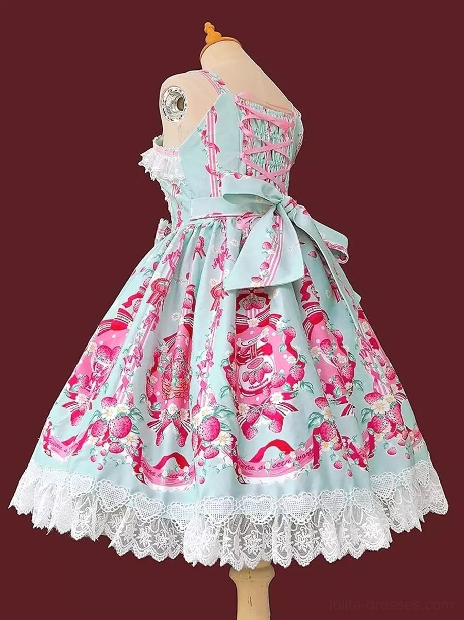 Sweet lolita dress back view in mint green with light blue tone, lace-up back corset lacing, large waist bow detail, white lace hem trim, matching pink floral prints on burgundy background